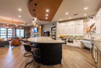 Resident Lounge Area with Arcade - Island Kitchen - Gourmet Kitchen